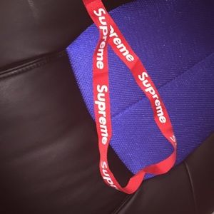 Red supreme lanyard and sticker